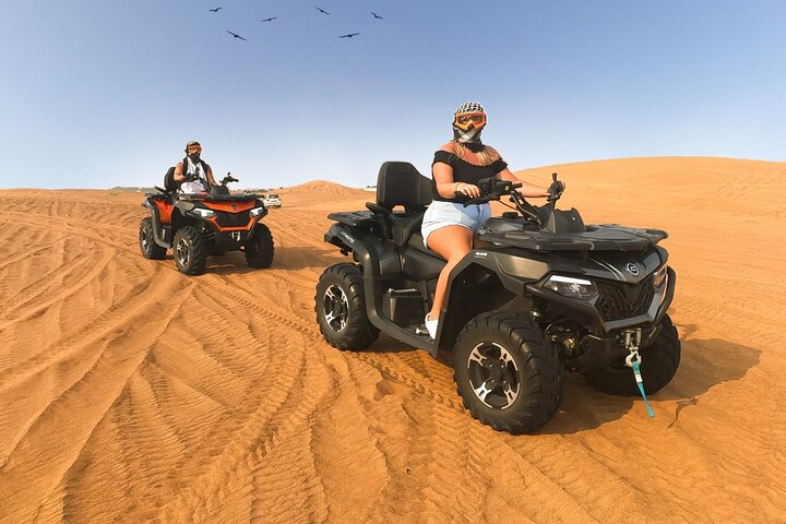 Experience the excitement of gliding across golden sands riding advanced dune buggies and quad bikes surrounded by the stunning landscape of the Arabian desert. Adventure awaits on every turn!
